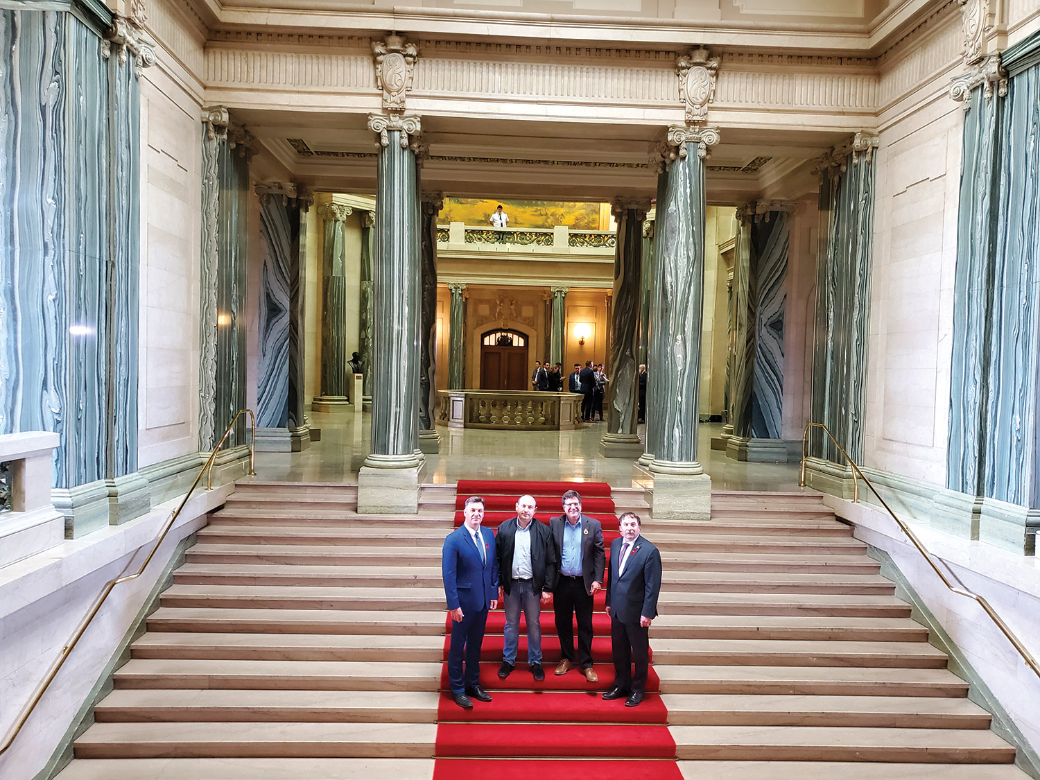 Welcome at the Legislature Andrii Mishtal and Kevin Kay were welcomed to the Saskatchewan Legislature Thursday. From left are Moosomin MLA Steven Bonk, Andrii Mishtal, Kevin Kay, and Cannington MLA Daryl Harrison